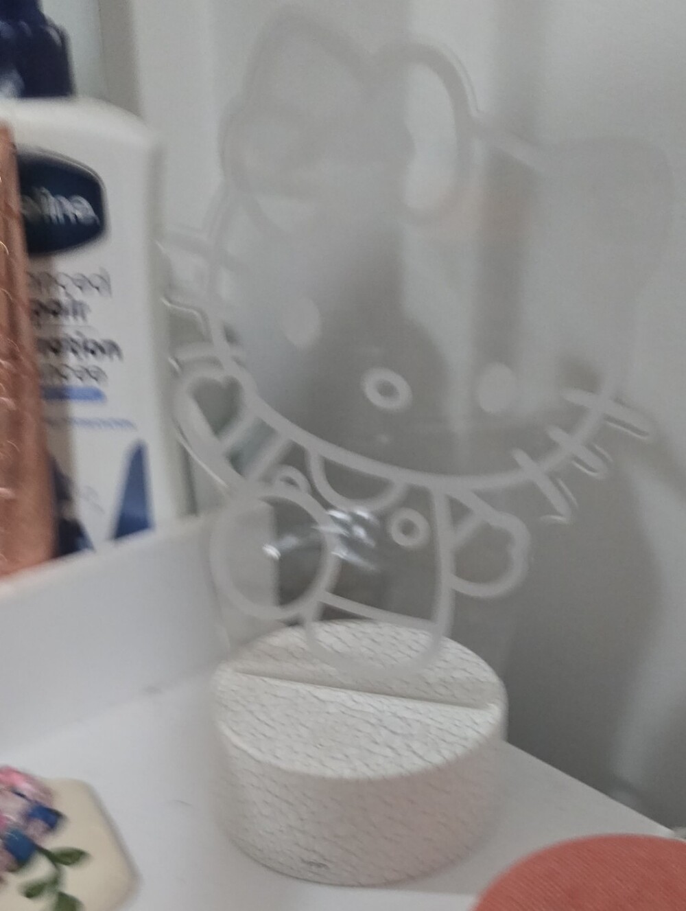 Hello Kitty Clear Acrylic Jewelry Stand with White Speckled Base